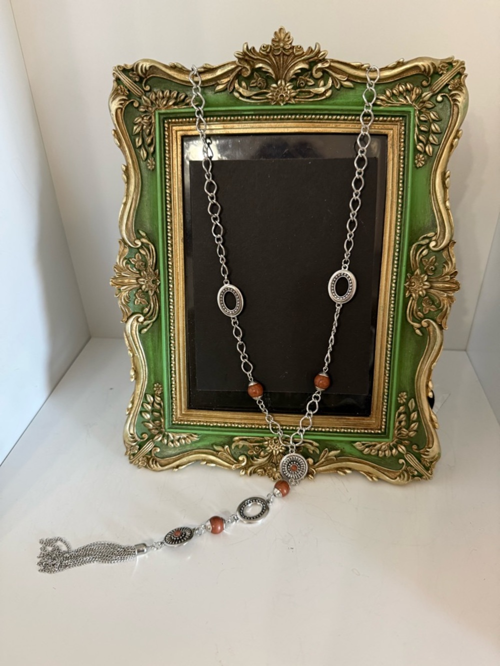 Silver-Tone Necklace with Brown Beads and Tassel